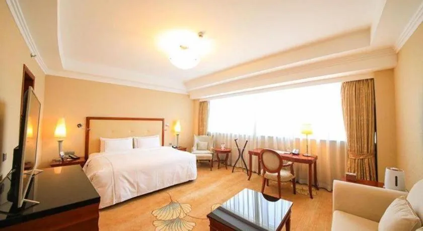 Bed in Jianguo Garden Hotel