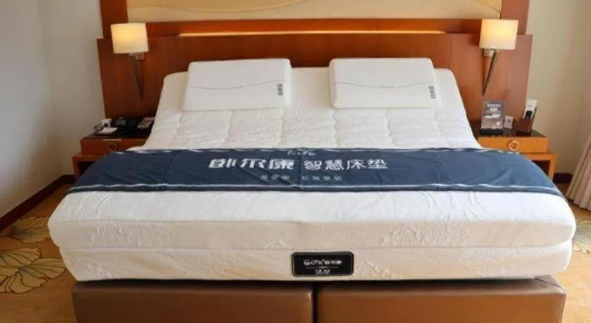 Bed in Jianguo Garden Hotel