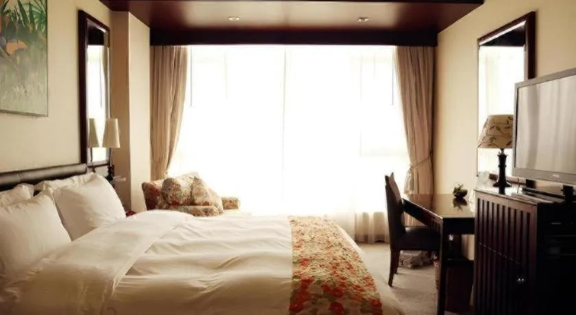 Bed in Seaview Gleetour Hotel Shenzhen Eastwing building