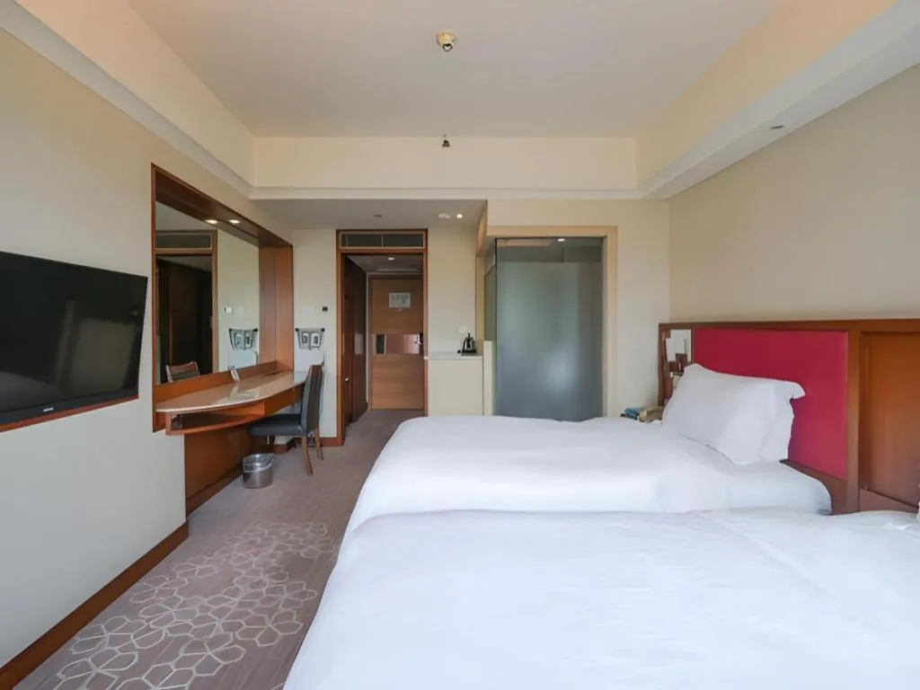 Bed in Seaview Gleetour Hotel Shenzhen Eastwing building