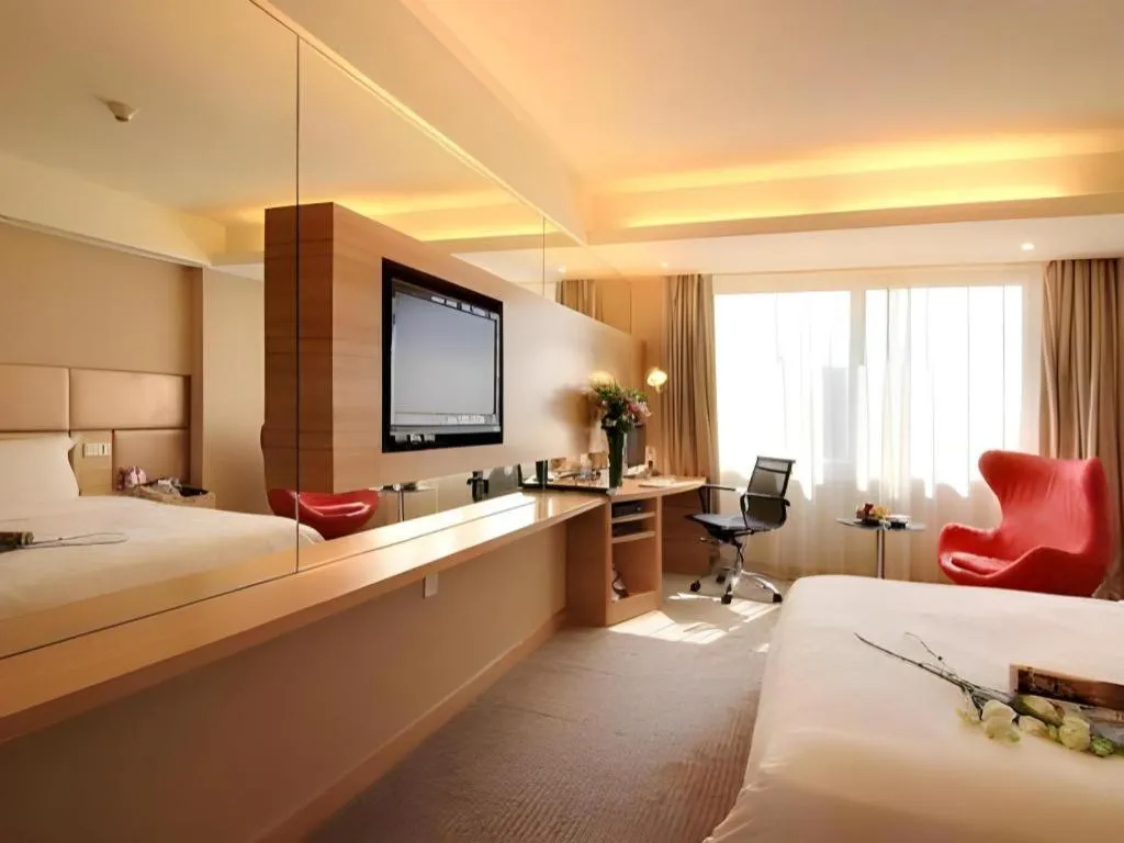Bed in Seaview Gleetour Hotel Shenzhen Eastwing building