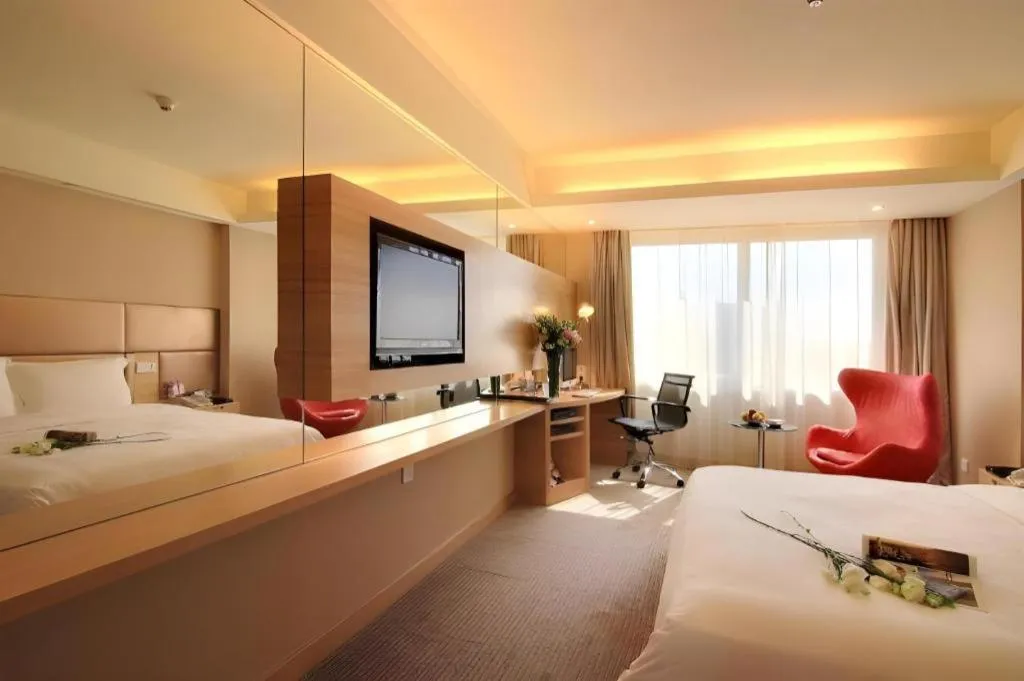 Bed in Seaview Gleetour Hotel Shenzhen Eastwing building