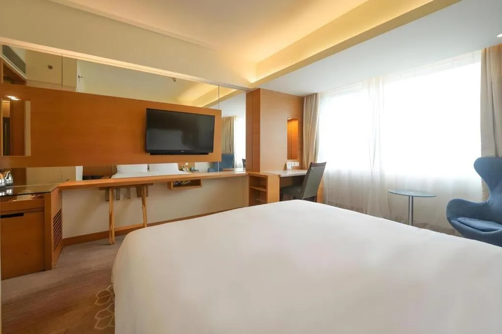 Bed in Seaview Gleetour Hotel Shenzhen Eastwing building