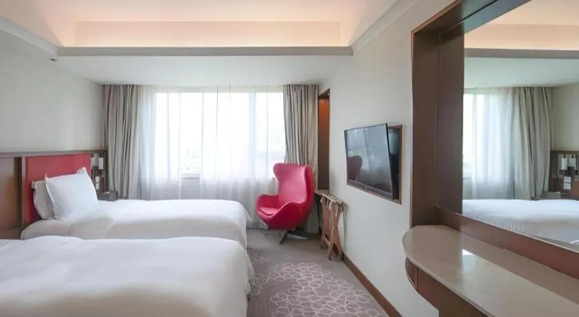 Bed in Seaview Gleetour Hotel Shenzhen Eastwing building