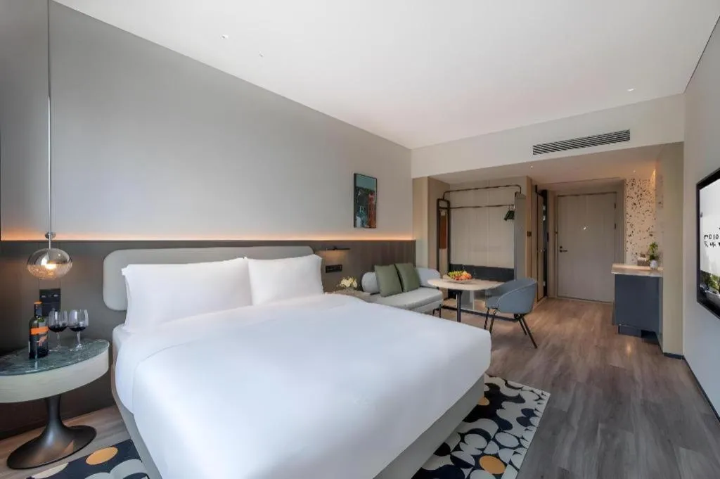 Bed in Seaview Gleetour Hotel Shenzhen Eastwing building