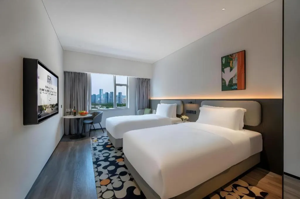 Bed in Seaview Gleetour Hotel Shenzhen Eastwing building