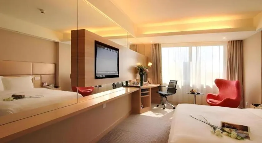 Bed in Seaview Gleetour Hotel Shenzhen Eastwing building