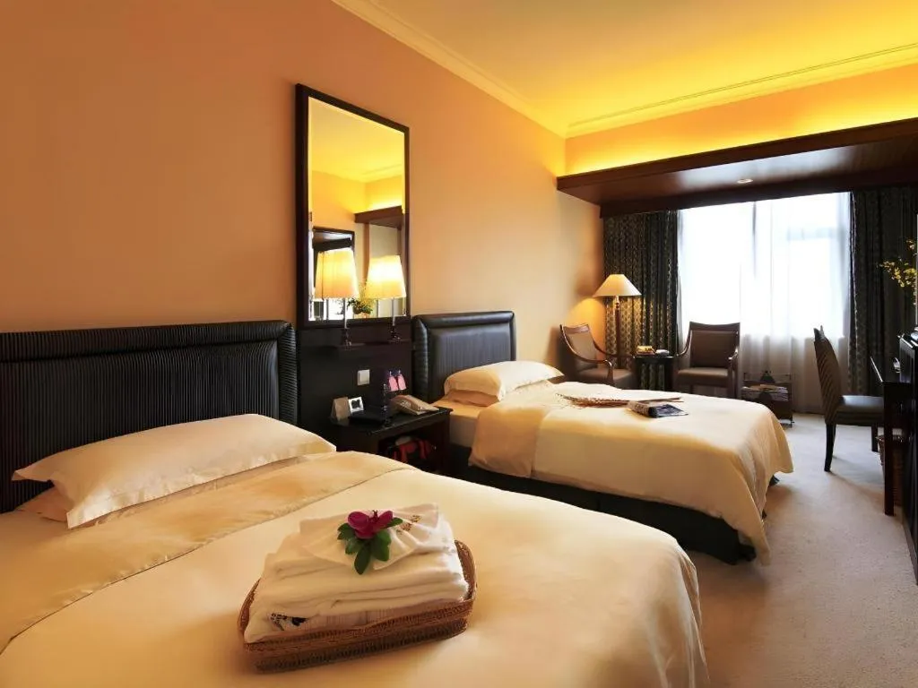 Bed in Seaview Gleetour Hotel Shenzhen Eastwing building