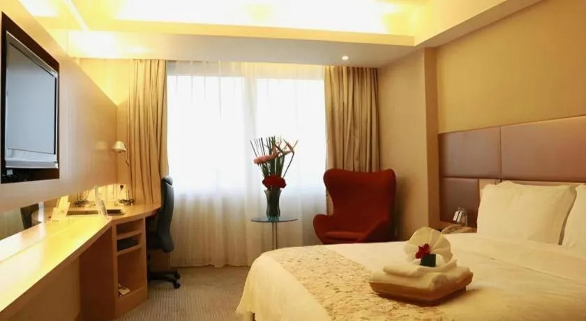 Bed in Seaview Gleetour Hotel Shenzhen Eastwing building