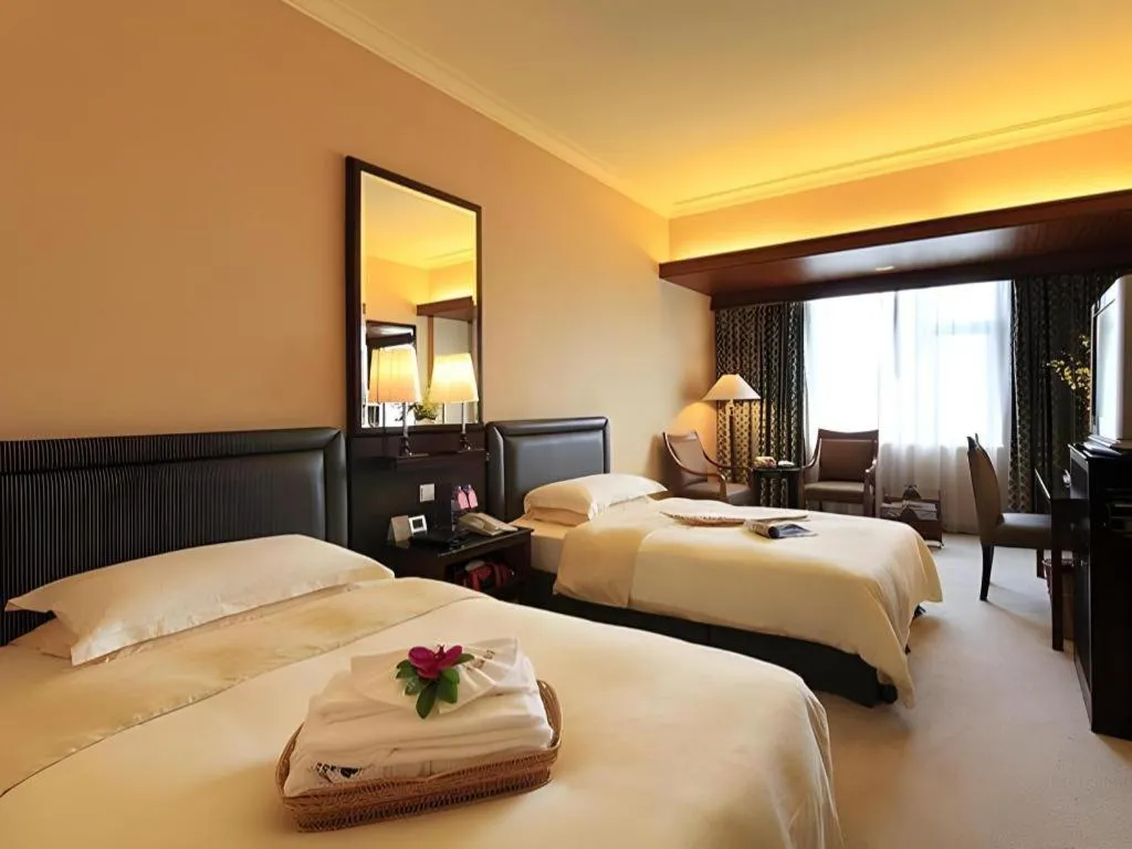 Bed in Seaview Gleetour Hotel Shenzhen Eastwing building