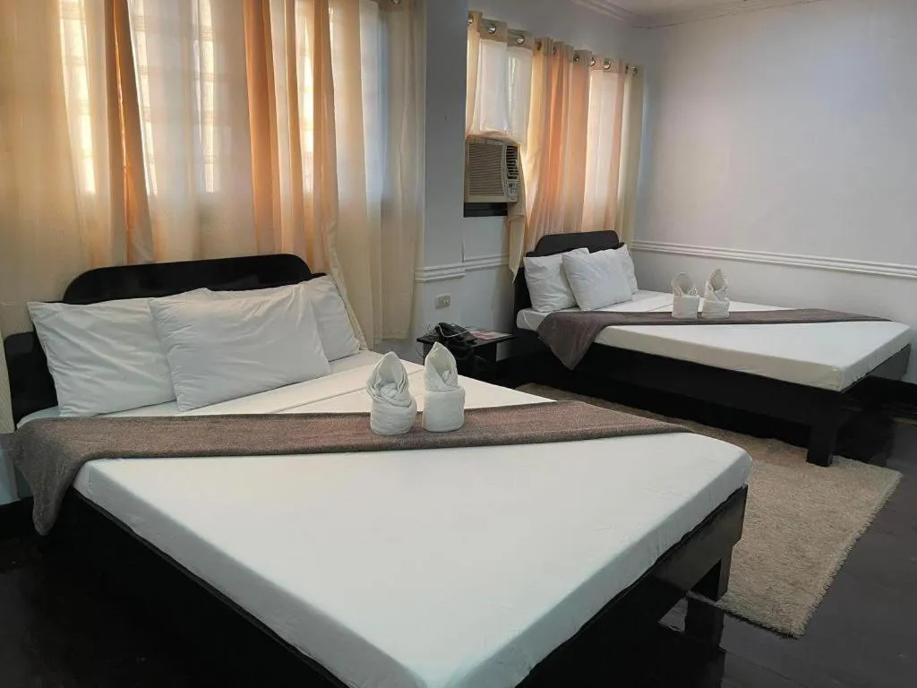 Bed in Vest Grand Suites