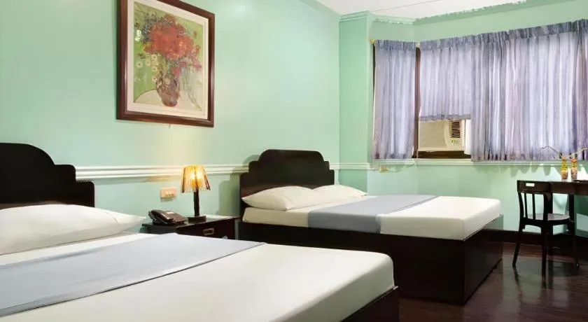 Bed in Vest Grand Suites