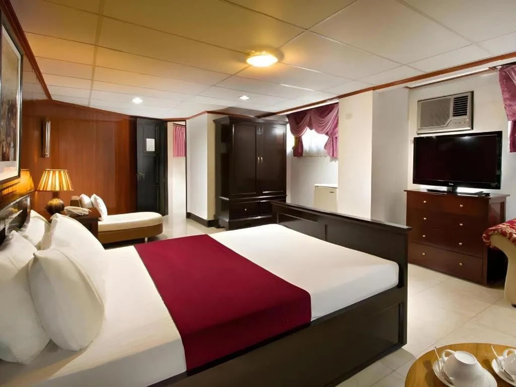 Bed in Vest Grand Suites