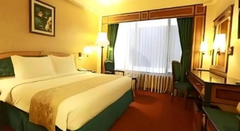 Bed in Gajahmada Graha Hotel