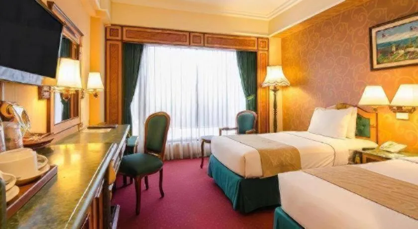 Bed in Gajahmada Graha Hotel