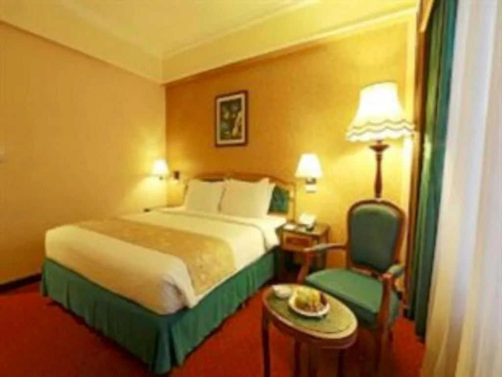 Bed in Gajahmada Graha Hotel