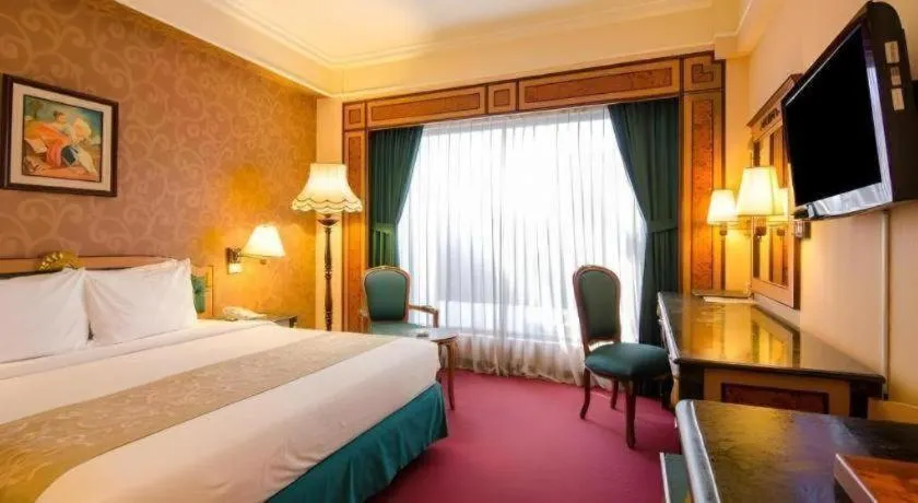 Bed in Gajahmada Graha Hotel