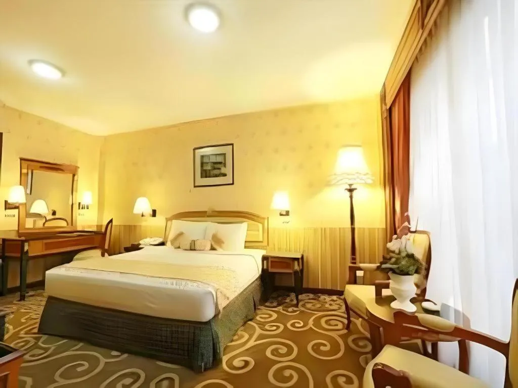 Bed in Gajahmada Graha Hotel