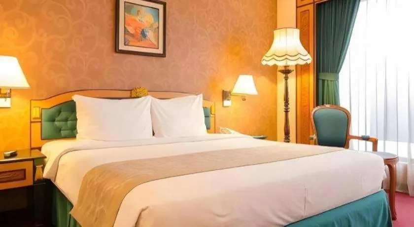 Bed in Gajahmada Graha Hotel