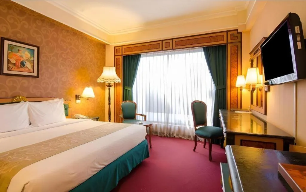 Bed in Gajahmada Graha Hotel