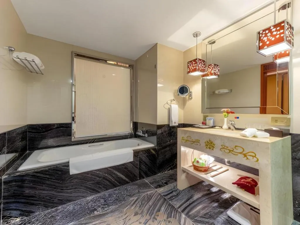 Bed in Yihe Grand Hotel