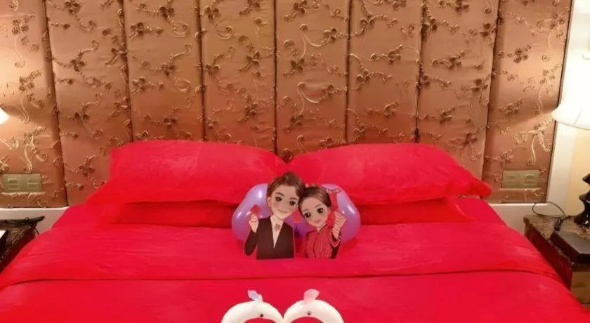 Bed in Yihe Grand Hotel