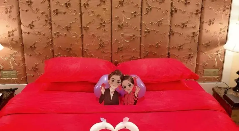 Bed in Yihe Grand Hotel