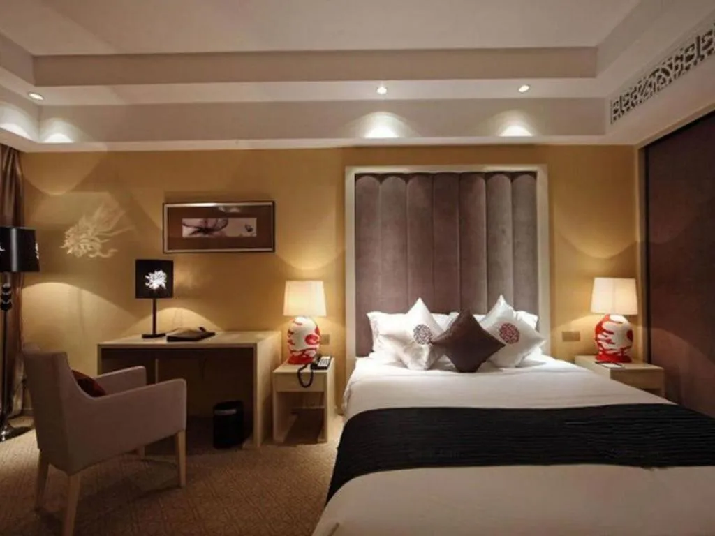 Bed in Yihe Grand Hotel