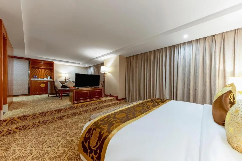 Bed in Yihe Grand Hotel