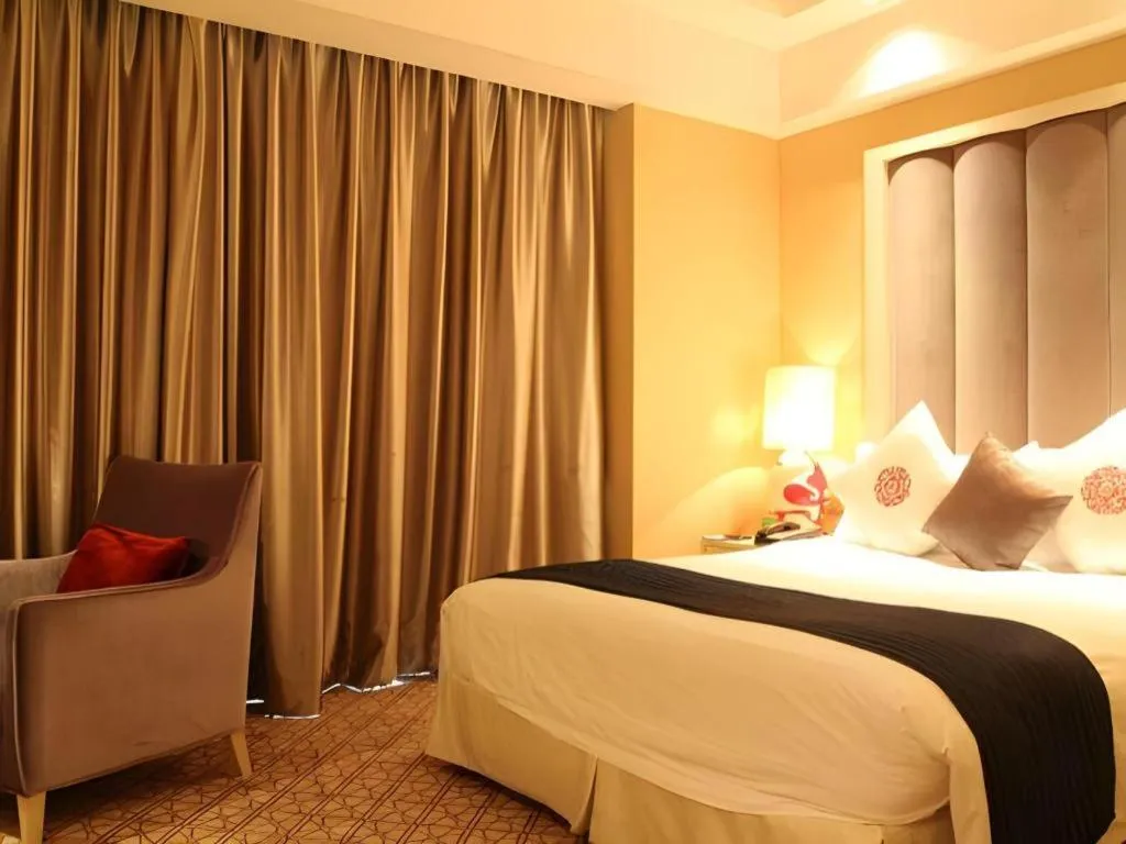 Bed in Yihe Grand Hotel