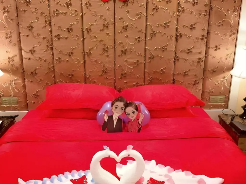 Bed in Yihe Grand Hotel