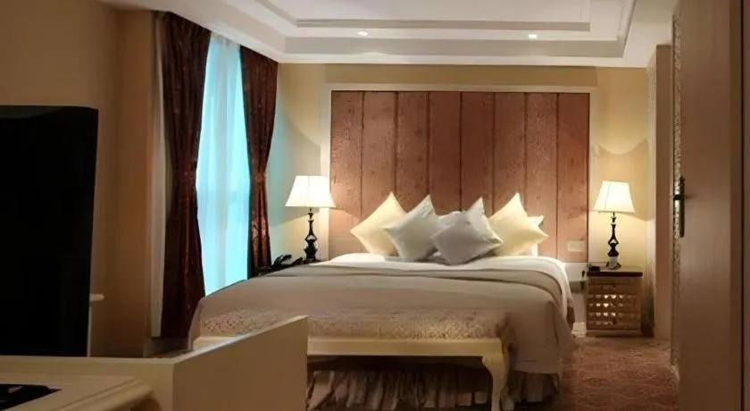 Bed in Yihe Grand Hotel