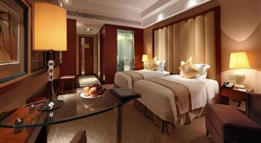 Bed in Yihe Grand Hotel
