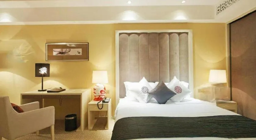 Bed in Yihe Grand Hotel