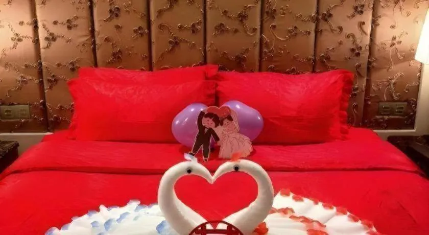 Bed in Yihe Grand Hotel