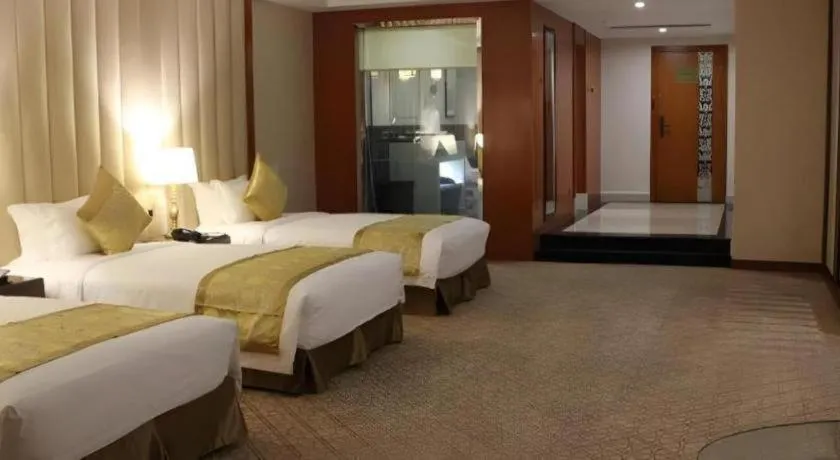 Bed in Yihe Grand Hotel