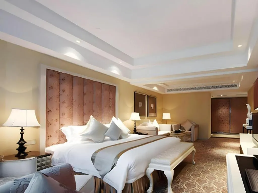 Bed in Yihe Grand Hotel