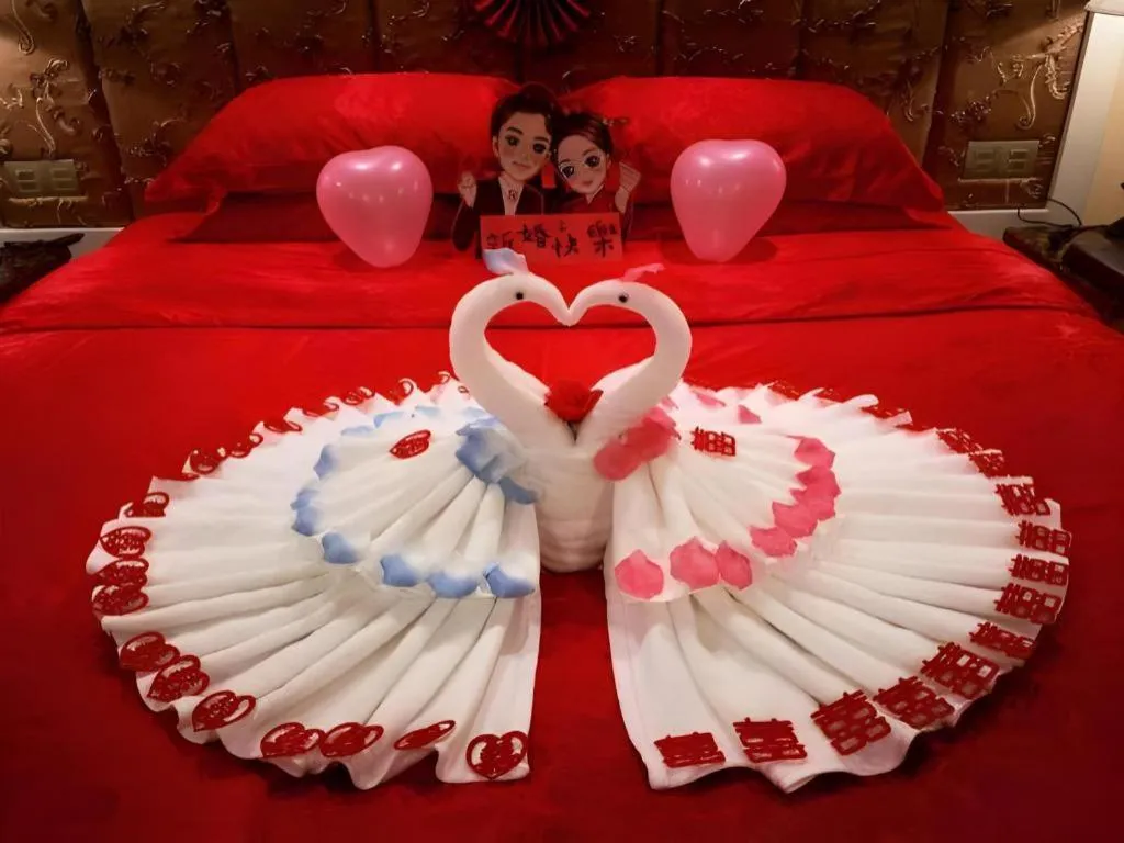 Bed in Yihe Grand Hotel