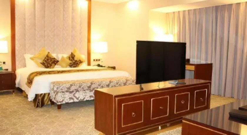 Bed in Yihe Grand Hotel