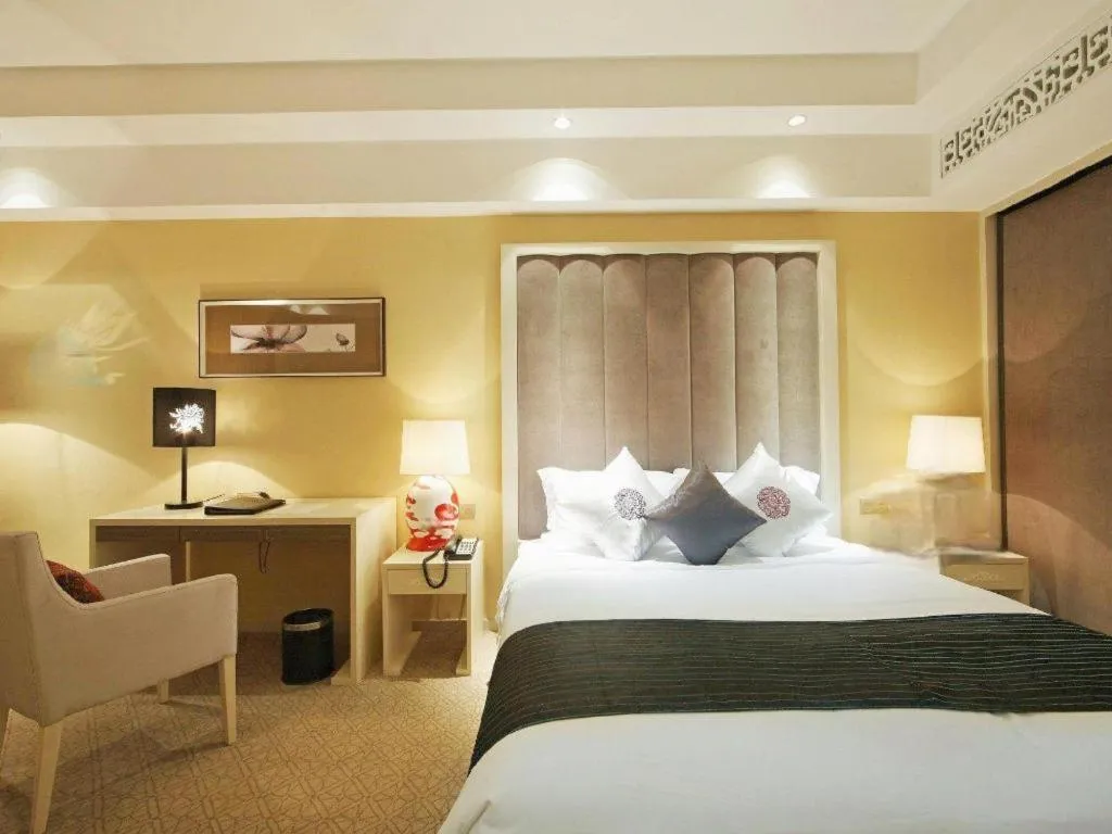 Bed in Yihe Grand Hotel