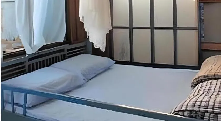 Bed in Baan ChanKhiang at ChiangKhan