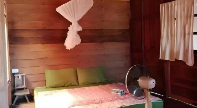 Bed in Baan ChanKhiang at ChiangKhan