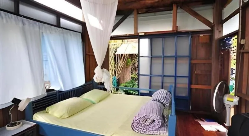 Bed in Baan ChanKhiang at ChiangKhan