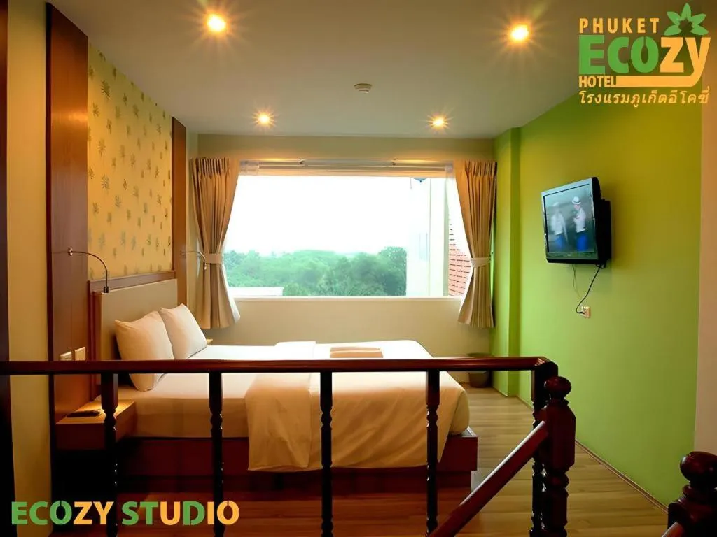 Bed in Phuket Ecozy Hotel