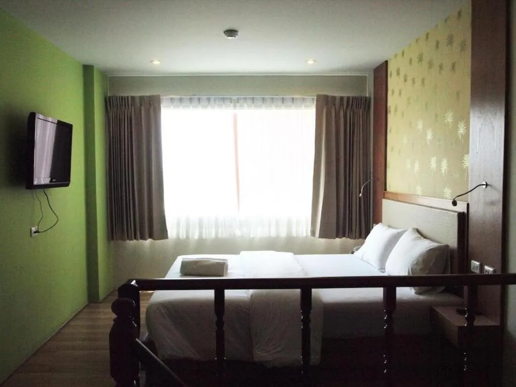 Bed in Phuket Ecozy Hotel