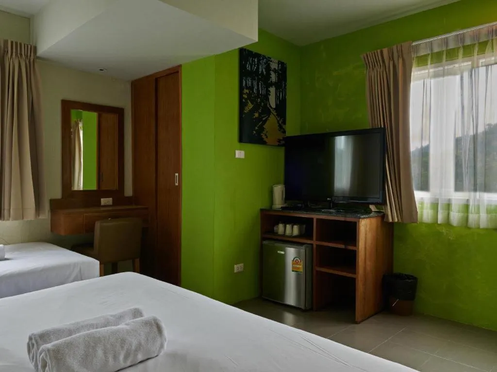 Bed in Phuket Ecozy Hotel