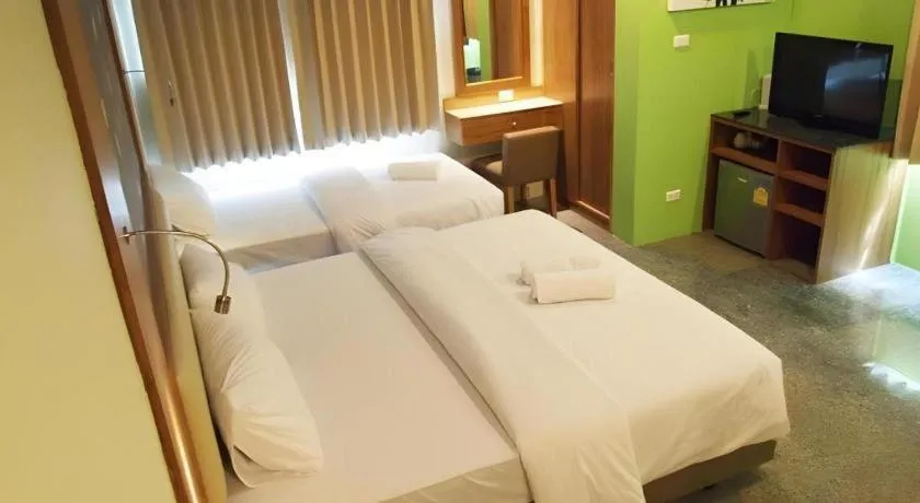 Bed in Phuket Ecozy Hotel