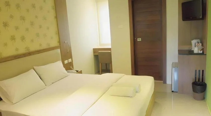 Bed in Phuket Ecozy Hotel