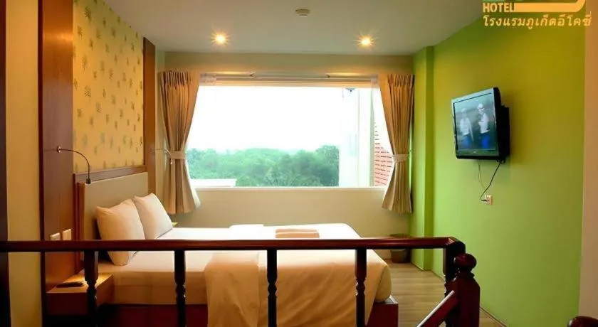 Bed in Phuket Ecozy Hotel