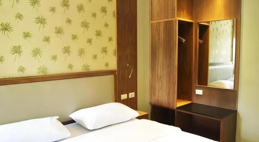 Bed in Phuket Ecozy Hotel